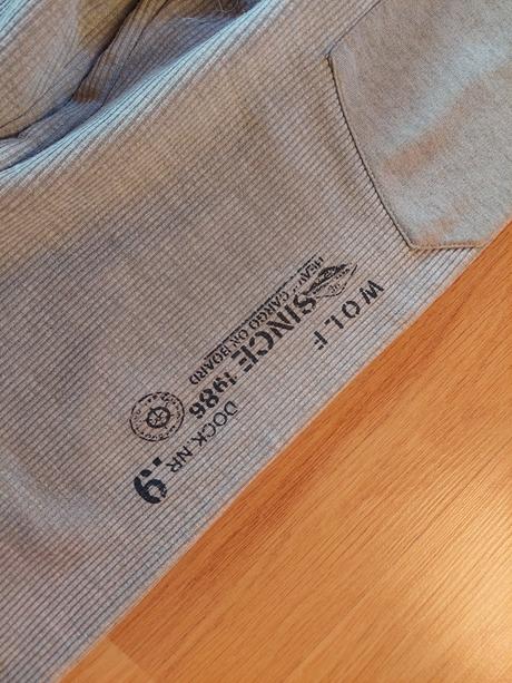 Tepláky zn. wolf, šedé-nápisy v. 110, wolf,110