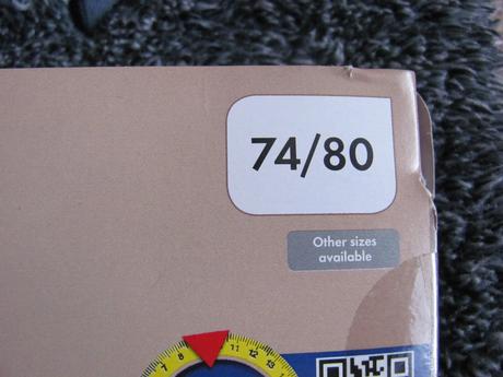 Šedý chlupatý overal, lupilu,74