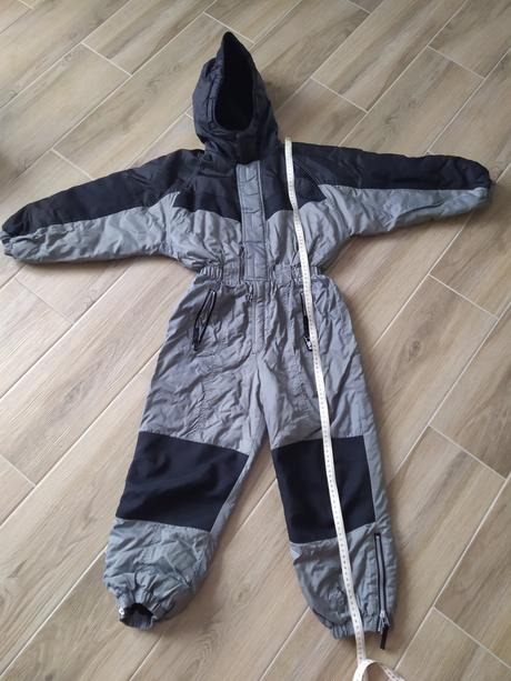 Černá kombinéza, 128