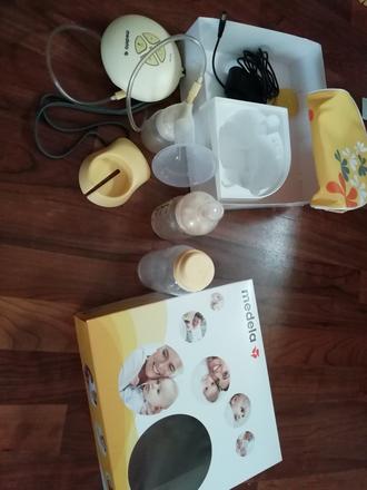 Odsávačka medela swing,