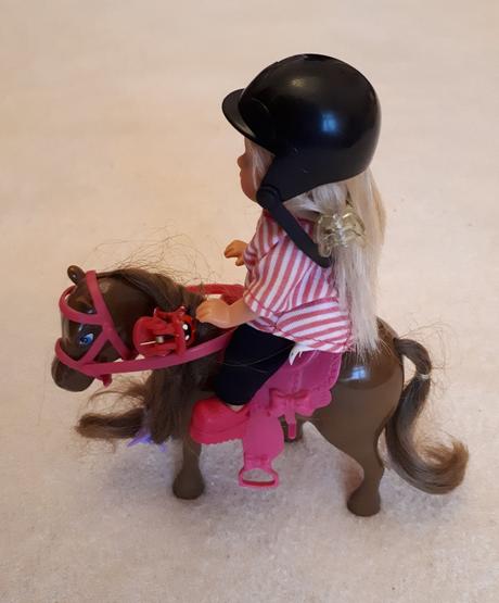 Panenka evička, žokejka na koni, zn.simba,
