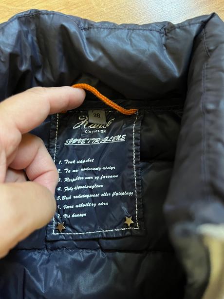 Lehká péřová vesta haust, 38