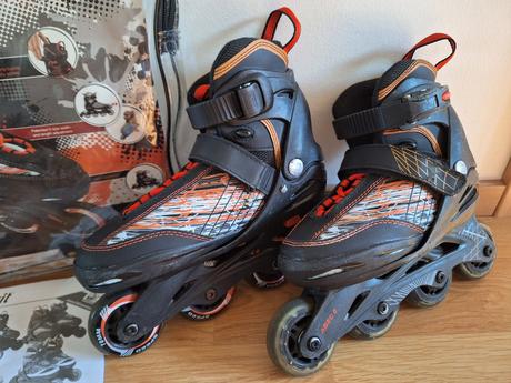 In-line brusle černo-oranžové, vel. 32-36, crivit