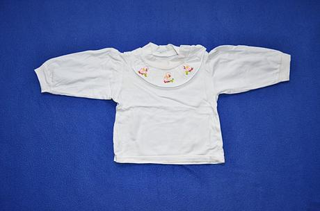 Kojenecká košilka, 56