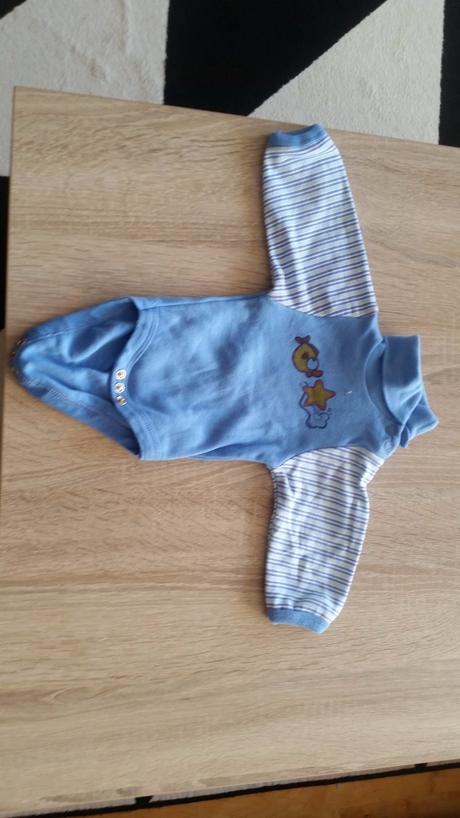 Body s roláčkem na mimi, 56