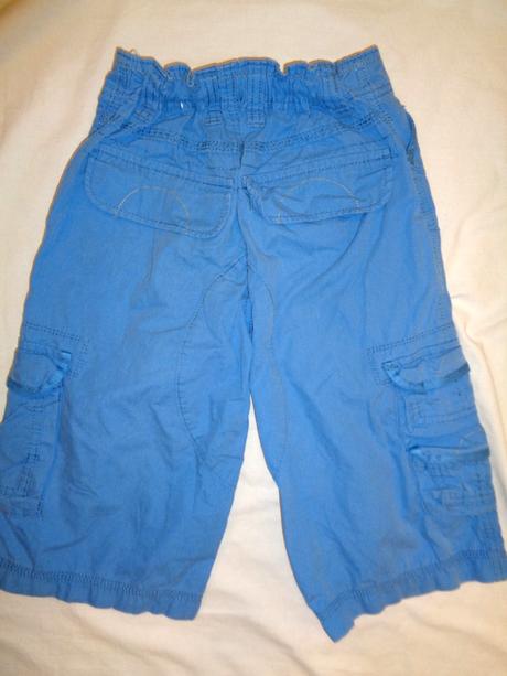 Luxusní modré delší kraťasy - kapsáče, next,128
