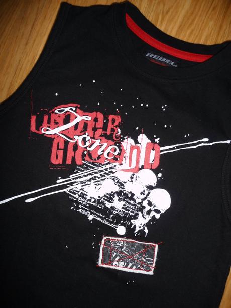 Černé tílko rebel na 9-10l- vel.140, rebel,140