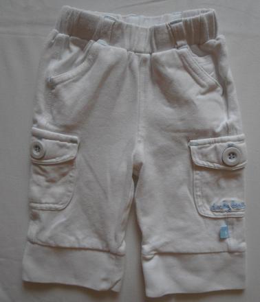 T42. bílé bavlněné tepláky, 56