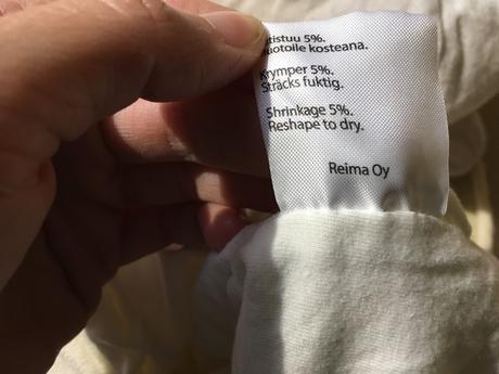 2 bílé vlněné čepičky - dvojčata, reima