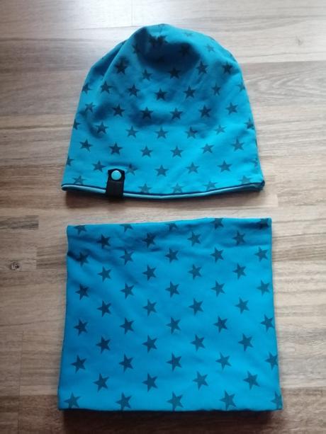 Čepice a nákrčník, 134