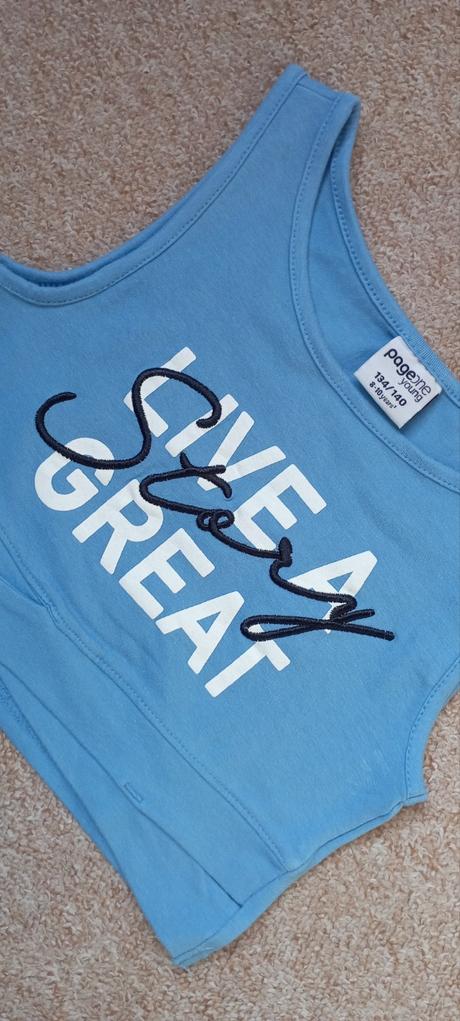 Crop top zn."page one young" vel."134-140", 134