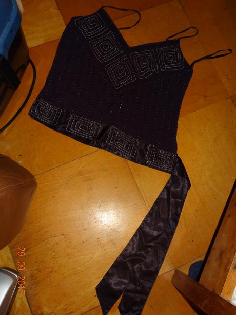 Slavnostní tílko, 158