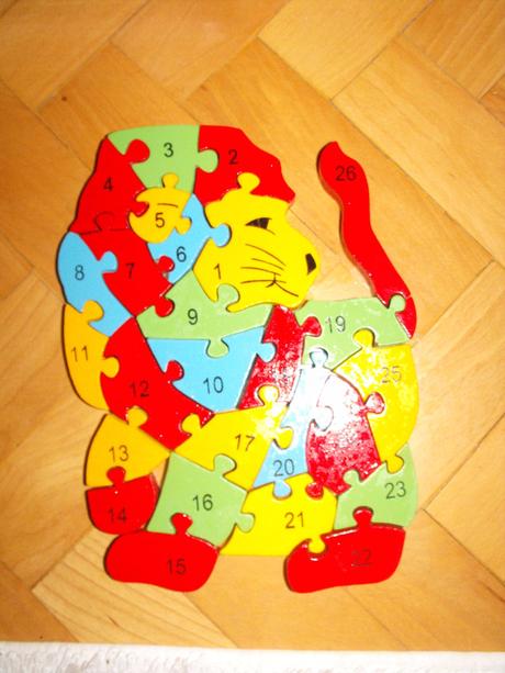 Dřevěný puzzle lev,