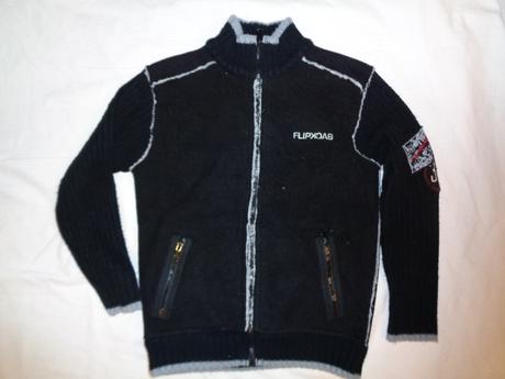 Luxusní černá bunda vyteplená kožíškem, 140