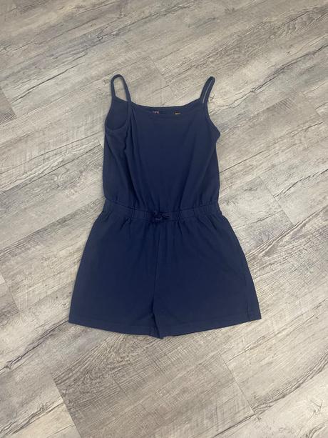 Kraťasový overal, 134