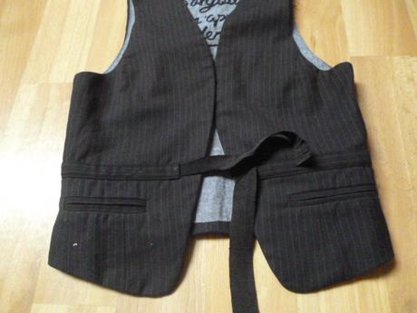 Krásná vesta vel. 8 l, 128