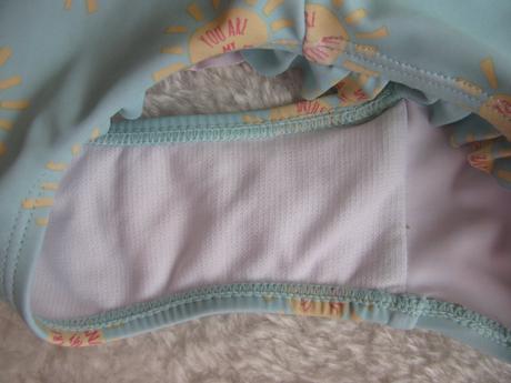 Tyrkysové plavky se sluníčky a s volánky v.4-5 let, primark,110