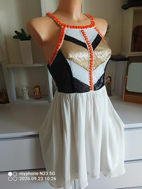 Šaty zn."xenia boutique" vel."8",