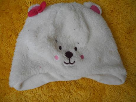 Chlupatá čepice, 74