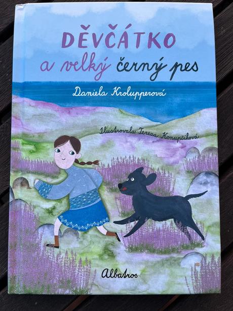 Děvčátko a velký černý pes,