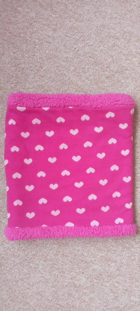 Tm růžový nákrčník, 