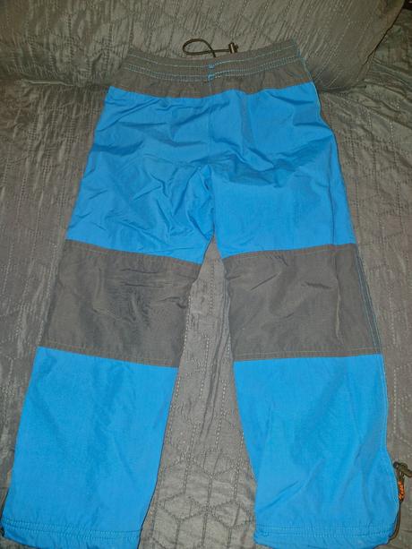 Zimní modré zateplené kalhoty zn. kugo vel. 116, kugo,116