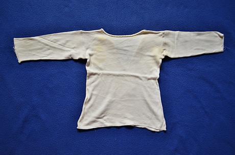 Kojenecká košilka, 56