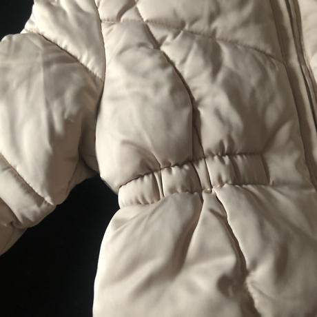 Světlá zimní bunda, 86