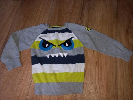 Svetr s obličejem, 104