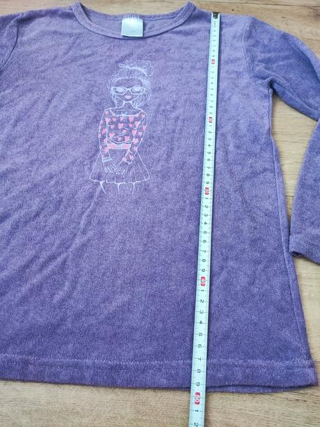 Fialové tričko, 134