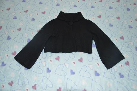 Černý krátký kabátek, 128