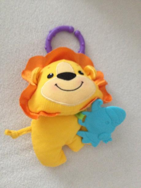 Chrastitko hracka lev fisher price,