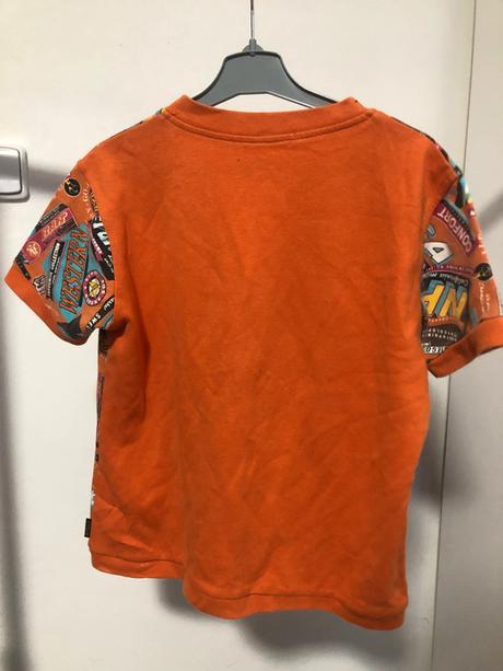 Oranžová pestrá vesta, 134