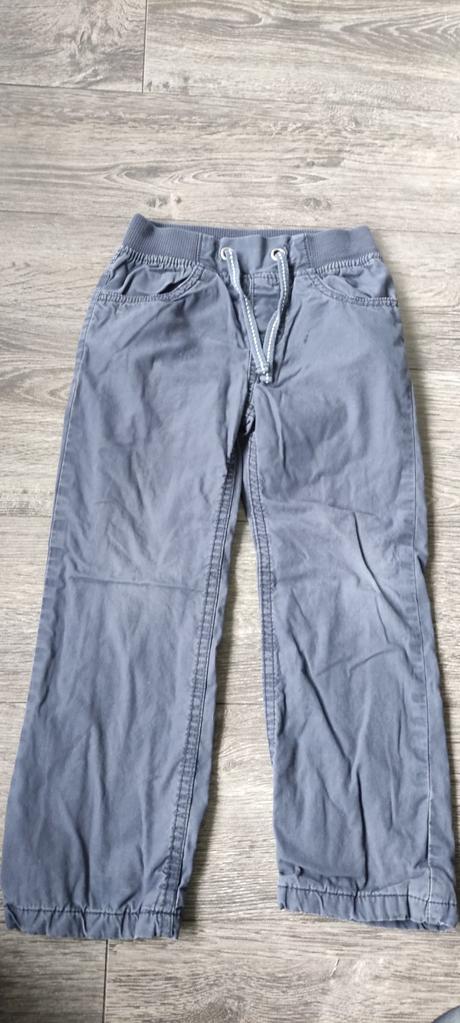 Tmavě modré kalhoty, lupilu,110