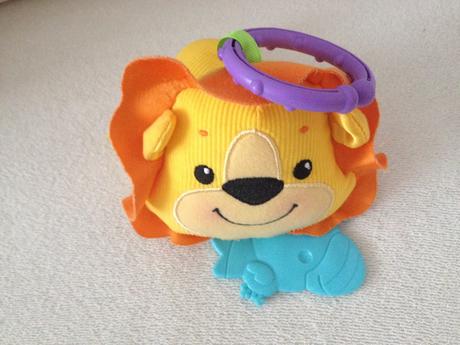 Chrastitko hracka lev fisher price,
