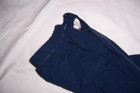 Tmavě modré šusťáky s podšívkou, 152