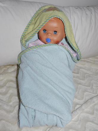 Rucnik s kapuckou a medvidkem pu, 