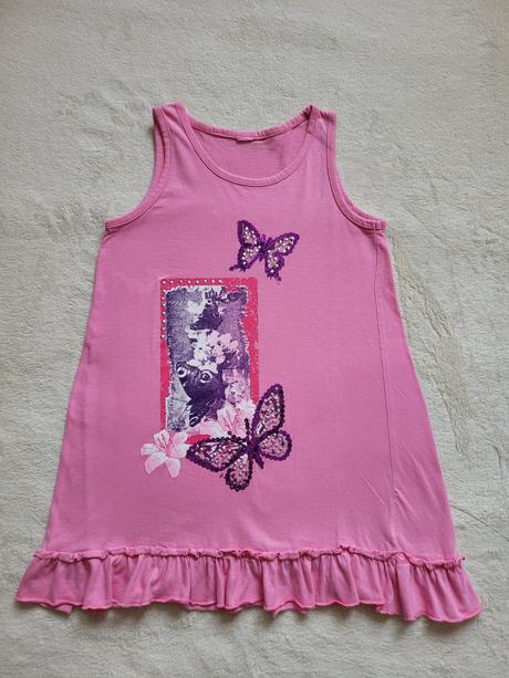 Tunika s motýly, 134