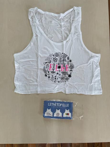 Nový krátký top/tílko, vel neuvedena kupoivána při, elle,s