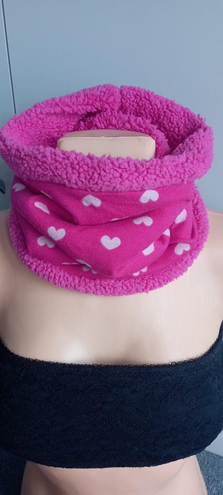 Tm růžový nákrčník, 