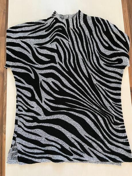 Zebrtovaný svetřík, 