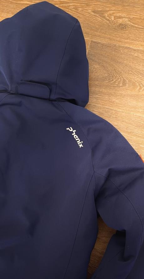 Lyžařská bunda phenix a nové kalhoty helly hansen, 152