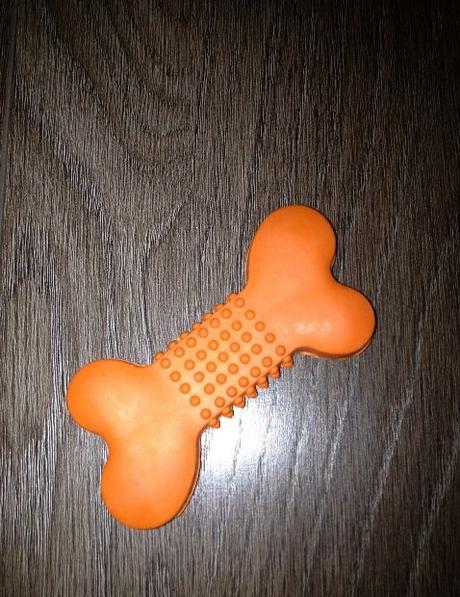 Hračka pro psy - oranžová gumová kost, 