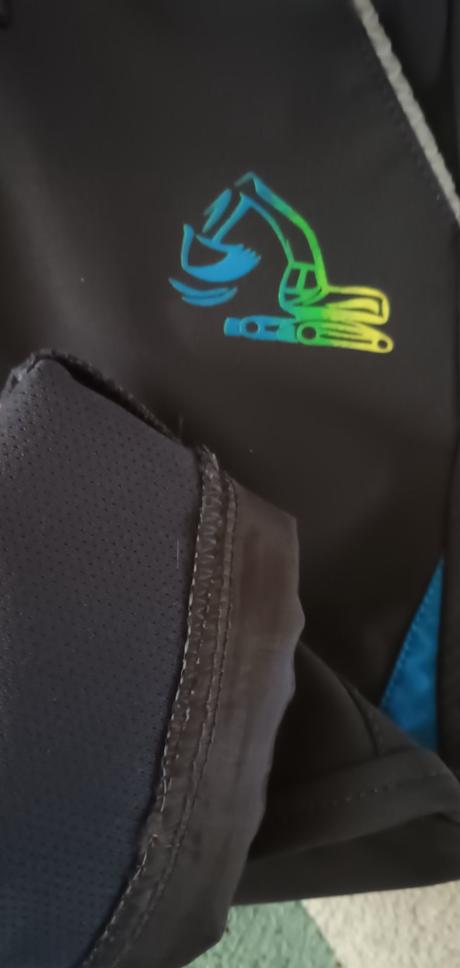 Jarní softshellové kalhoty s bagrem vel.86, kugo,86