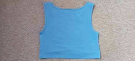 Crop top zn."page one young" vel."134-140", 134