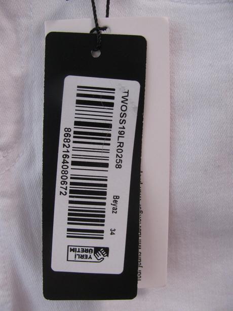 Bílé elastické přiléhavé džíny skiny, 34