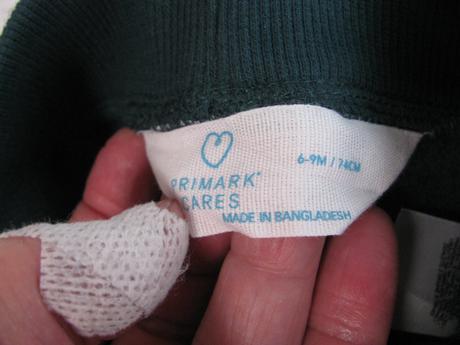 Bavlněné tmavě zelené tepláky s potiskem, primark,74