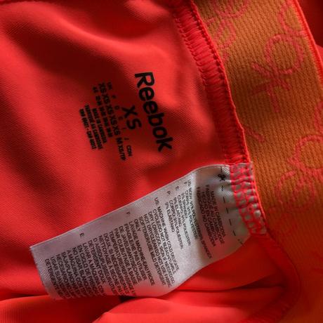 Neonově oranžové legíny, reebok,xs