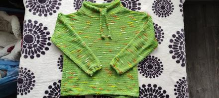 Zelený svetřík, 122