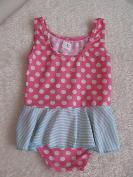 Jednodílné růžové plavky se sukýnkou, 86